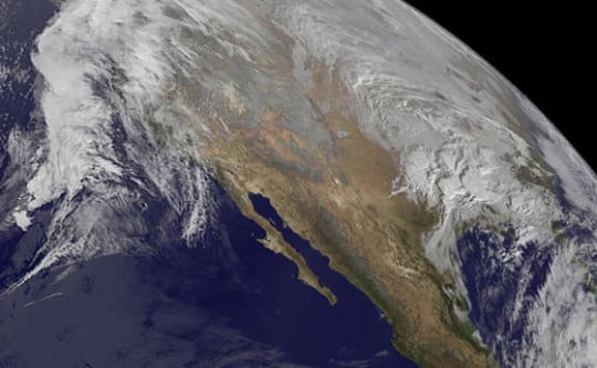 NOAA's GOES-West satellite imagery from Jan. 21 at 1500 UTC (10 a.m. EST) shows the large winter storm over near the Gulf coast and another storm approaching the Pacific coast. Credits: NASA/NOAA GOES Project